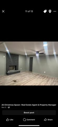 a view of kitchen with cabinets