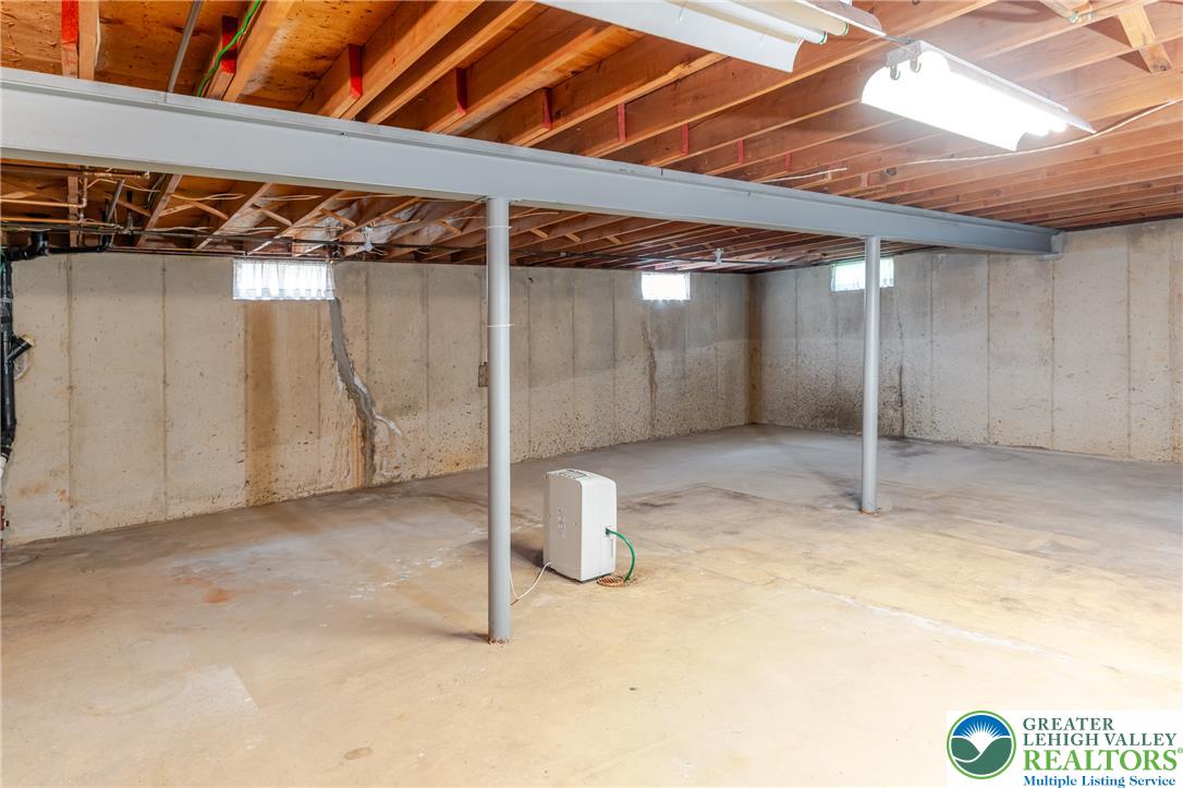 2130 Wisteria Road Lower Macungie Township, PA 18062 - Photo 40 of 48 A spacious unfinished basement offers potential for future customization.