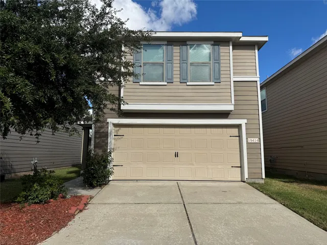 a view of house with outdoor space