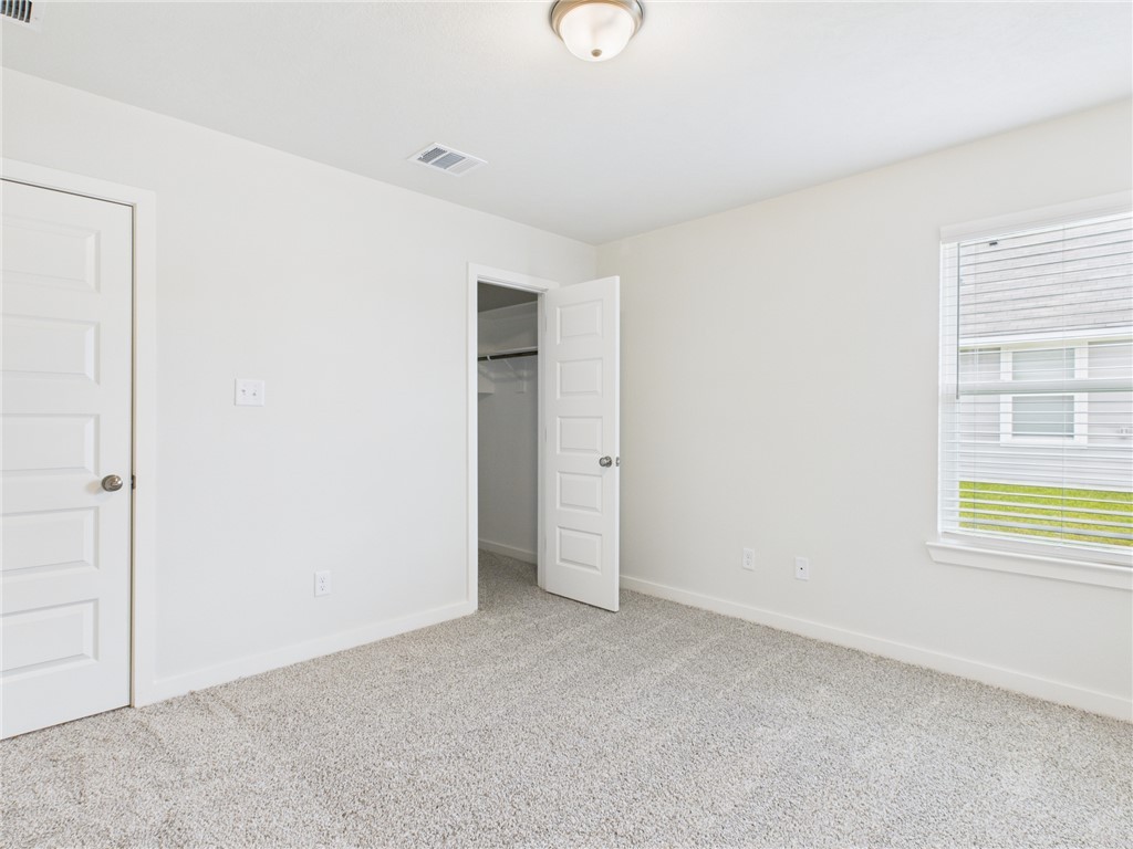 1932 Viva Road Bryan, TX 77807 - Photo 14 of 20 an empty room with windows