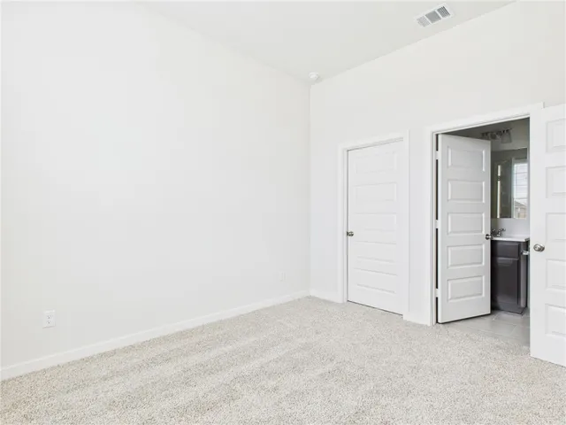 an empty room with closet