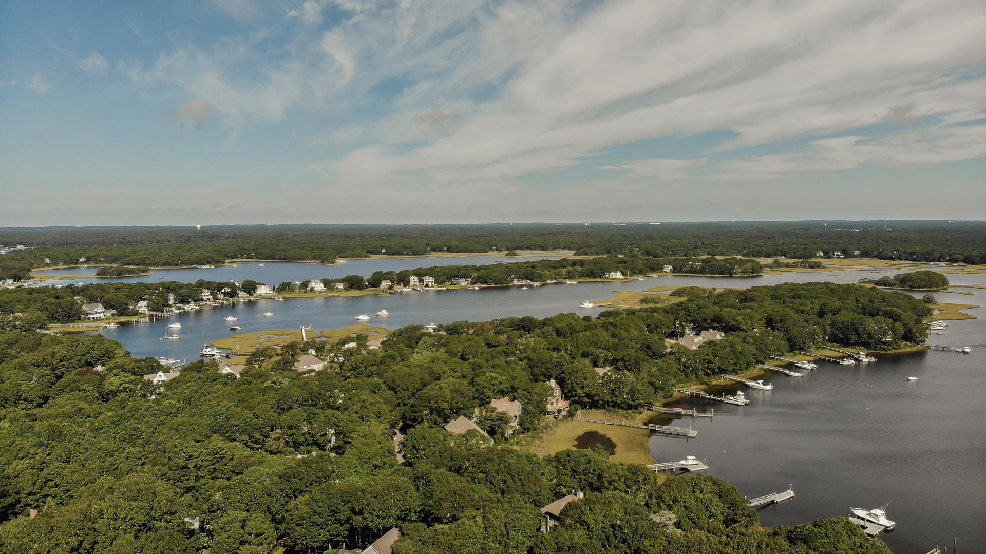 4 Topping Lift Mashpee, MA 02649 - Photo 3 of 24 an aerial view of a city with lots of residential buildings
