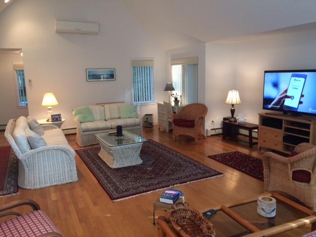 4 Topping Lift Mashpee, MA 02649 - Photo 5 of 24 a living room with furniture and a flat screen tv