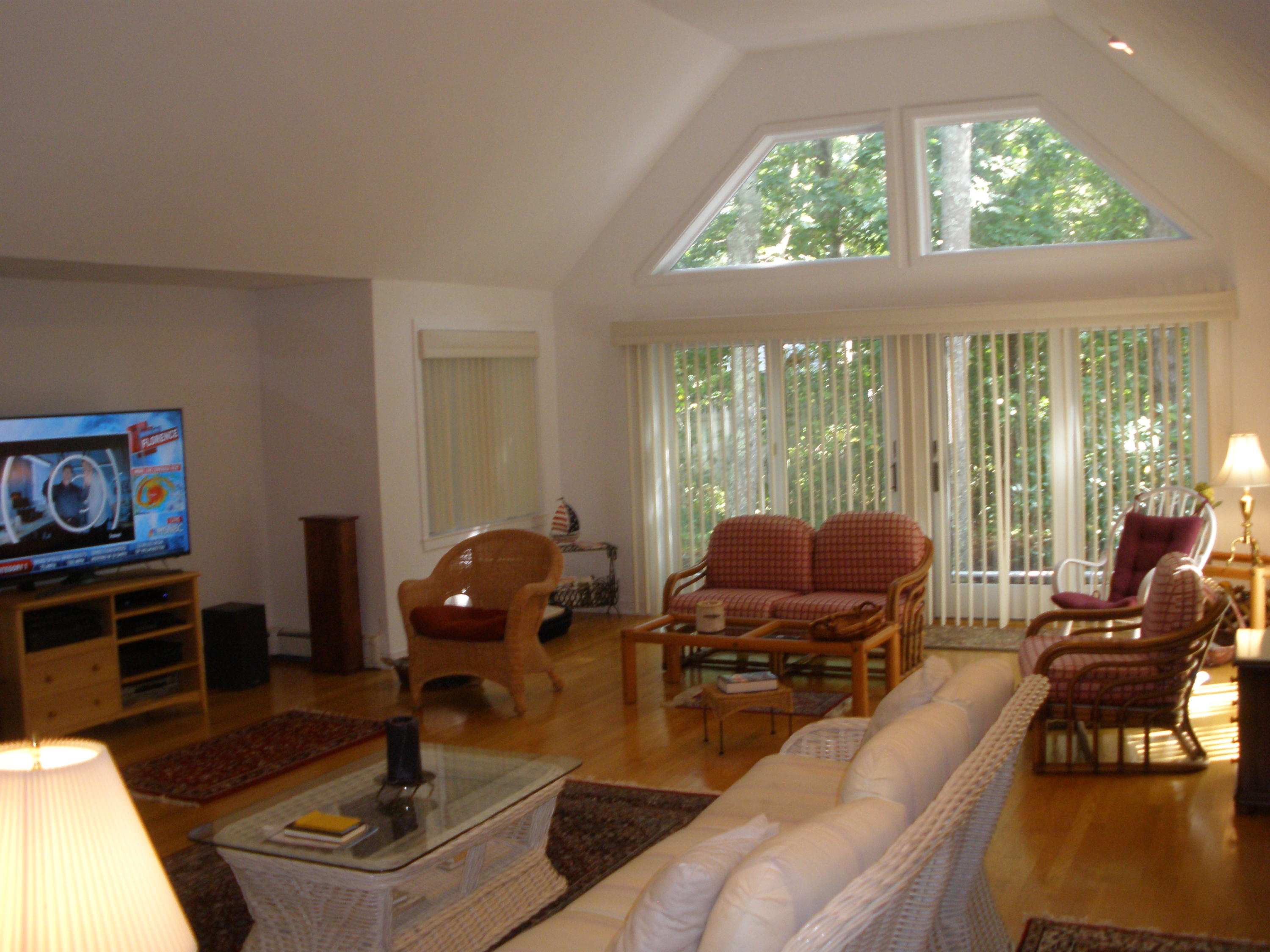 4 Topping Lift Mashpee, MA 02649 - Photo 6 of 24 a living room with furniture and a flat screen tv