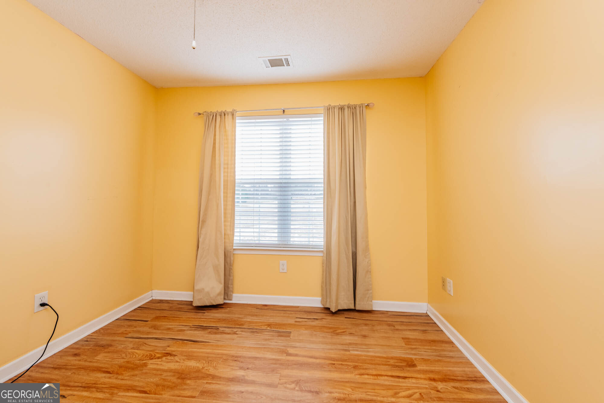 525 Hardison Church Road Byron, GA 31008 - Photo 15 of 32 a view of an empty room with a window