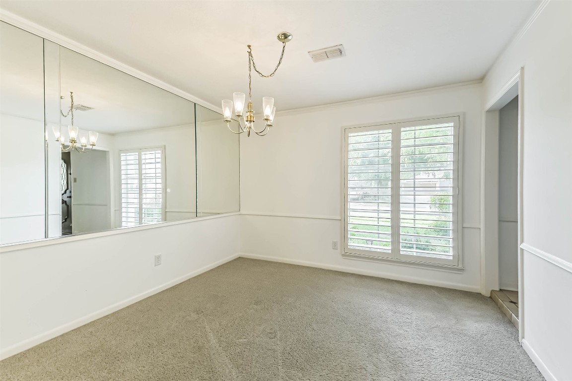 6915 Chancellor Drive Spring, TX 77379 - Photo 15 of 37 a view of an empty room with a window
