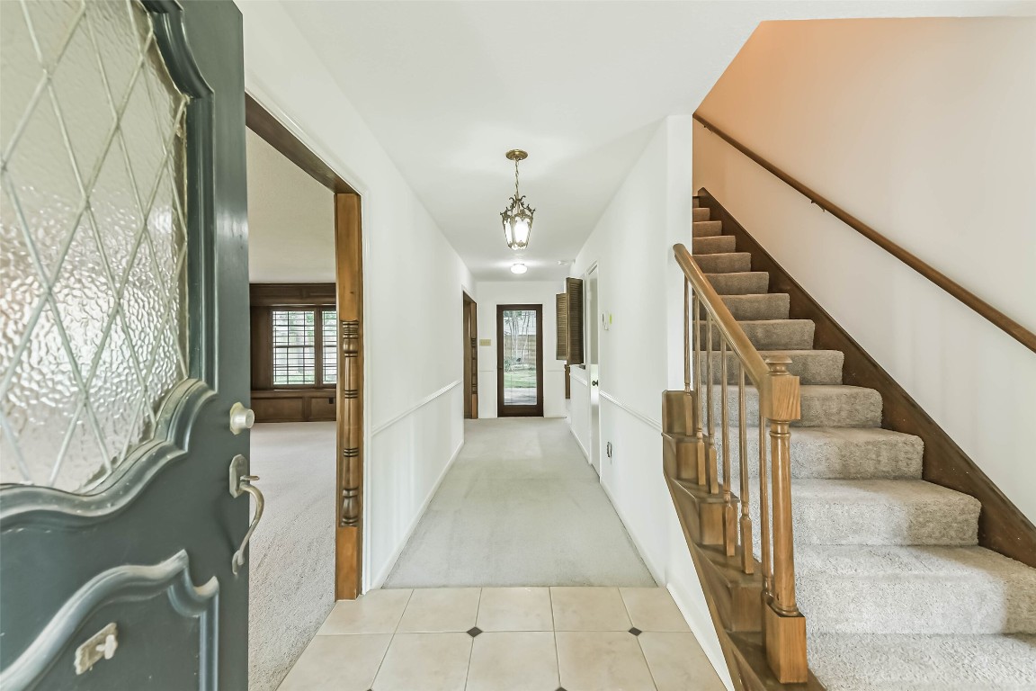 6915 Chancellor Drive Spring, TX 77379 - Photo 3 of 37 a view of a hallway with furniture and entryway