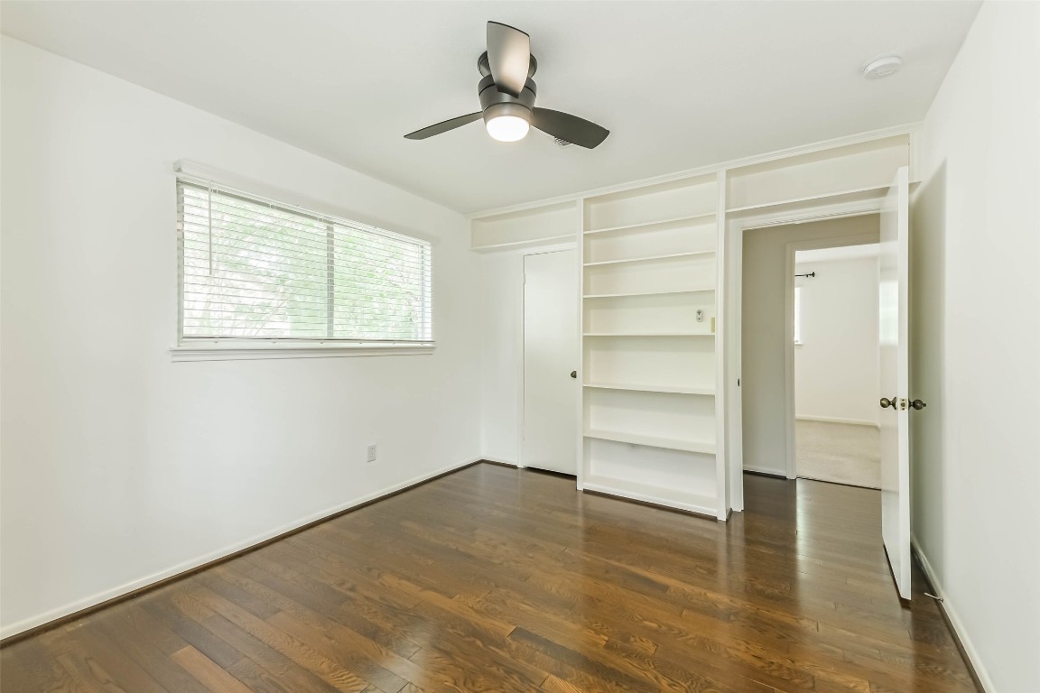 6915 Chancellor Drive Spring, TX 77379 - Photo 32 of 37 a view of an empty room with a window