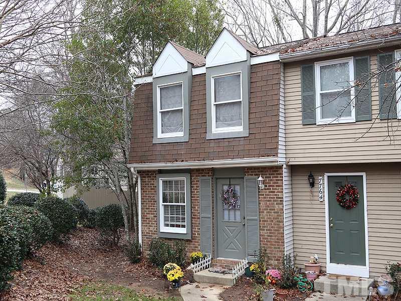 7766 Sandra Lane Raleigh, NC 27615 - Photo 2 of 14 a front view of a house with a yard