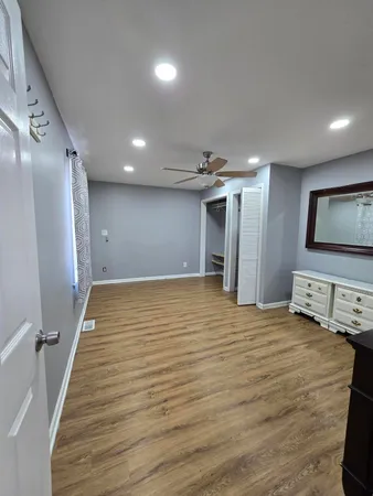 a view of a livingroom with wooden floor