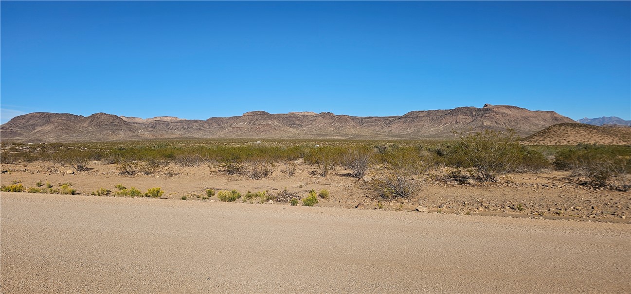Lot 152 South Bacobi Road Golden Valley, AZ 86413 - Photo 7 of 11 View of mountain backdrop