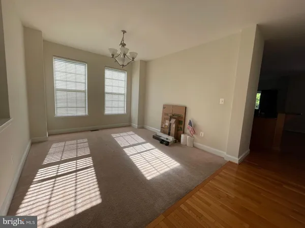 a view of livingroom with hardwood floor and window