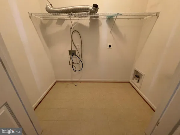 a bathroom with a granite countertop toilet a sink and a shower