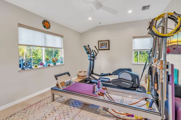 a kitchen that has a table and chairs in it