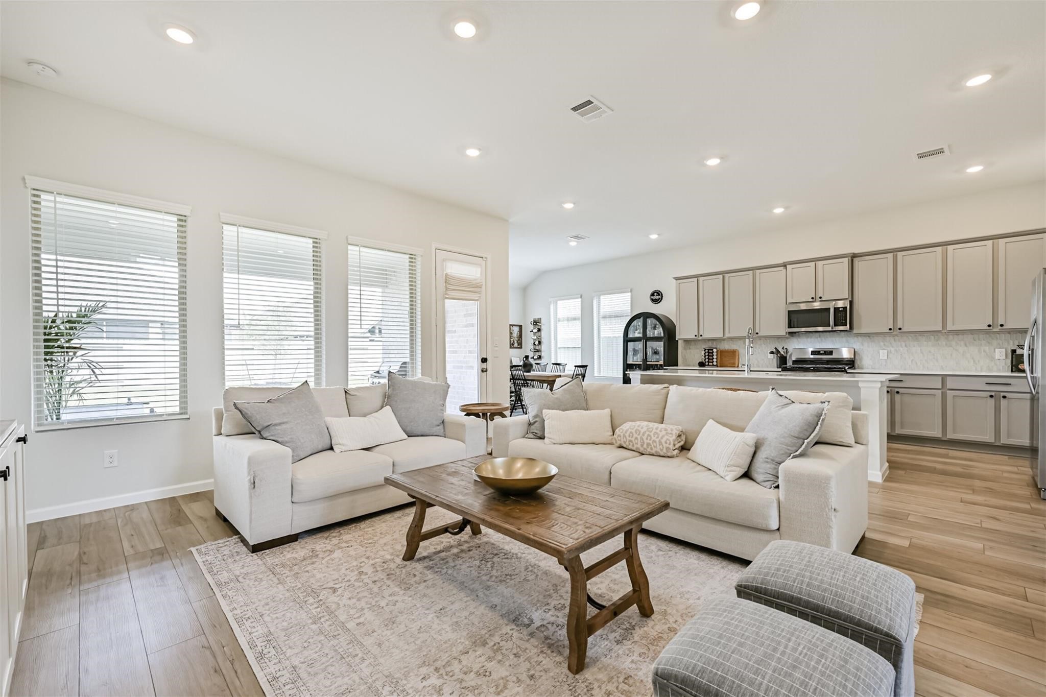 5010 Walnut Grv Lane Manvel, TX 77578 - Photo 17 of 46 a living room with furniture kitchen and a table