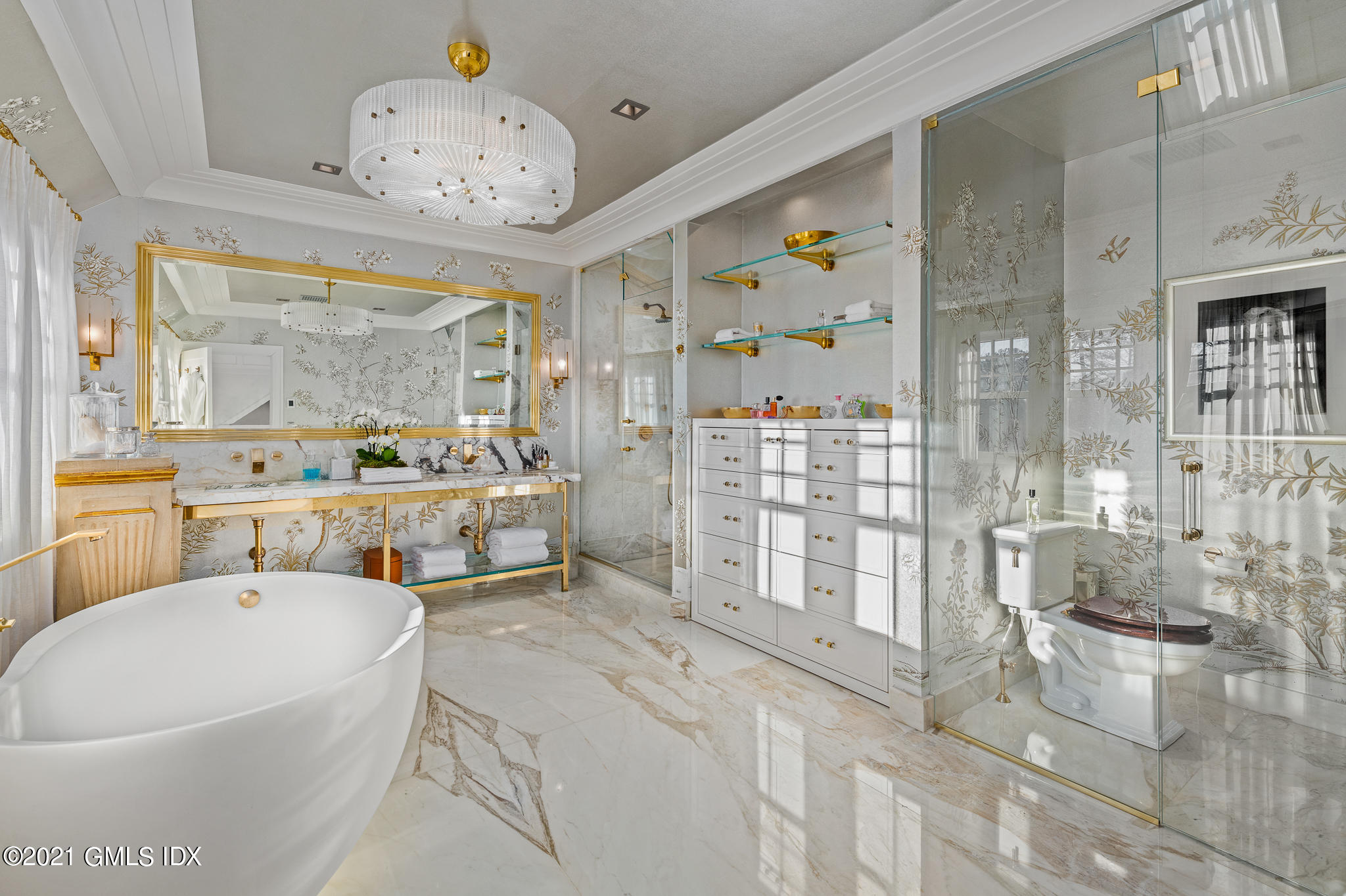 55 Byram Shore Road Greenwich, CT 06830 - Photo 15 of 30 a large white tub sitting next to a bathroom