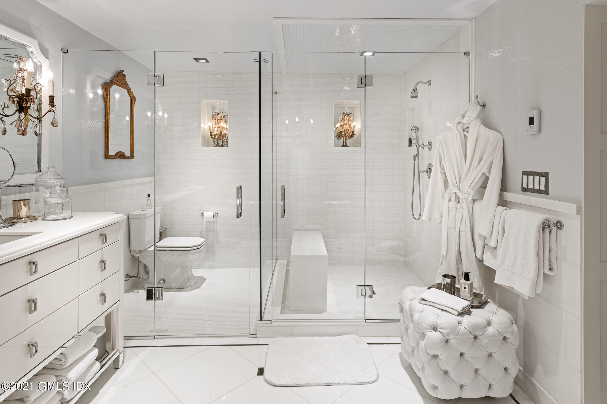 55 Byram Shore Road Greenwich, CT 06830 - Photo 21 of 30 a bathroom with a sink toilet and shower