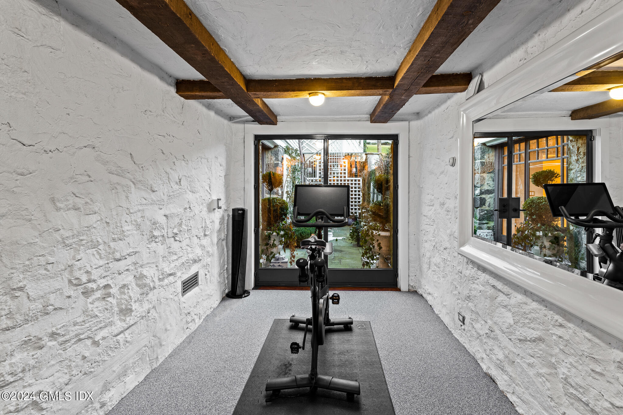 55 Byram Shore Road Greenwich, CT 06830 - Photo 24 of 30 a view of a lobby with chair and front door