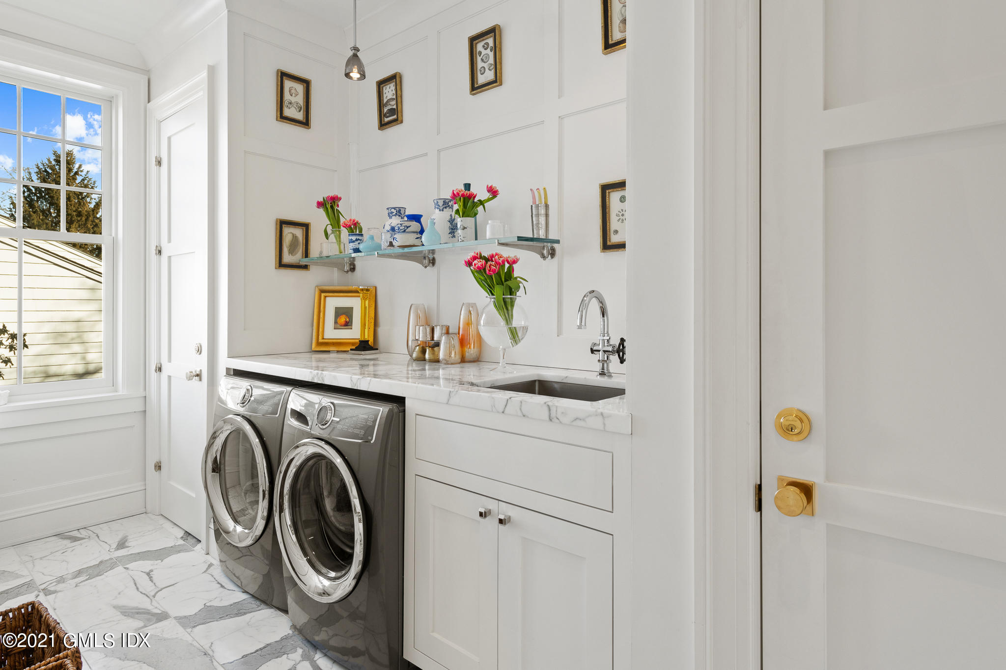 55 Byram Shore Road Greenwich, CT 06830 - Photo 25 of 30 a utility room with dryer and washer