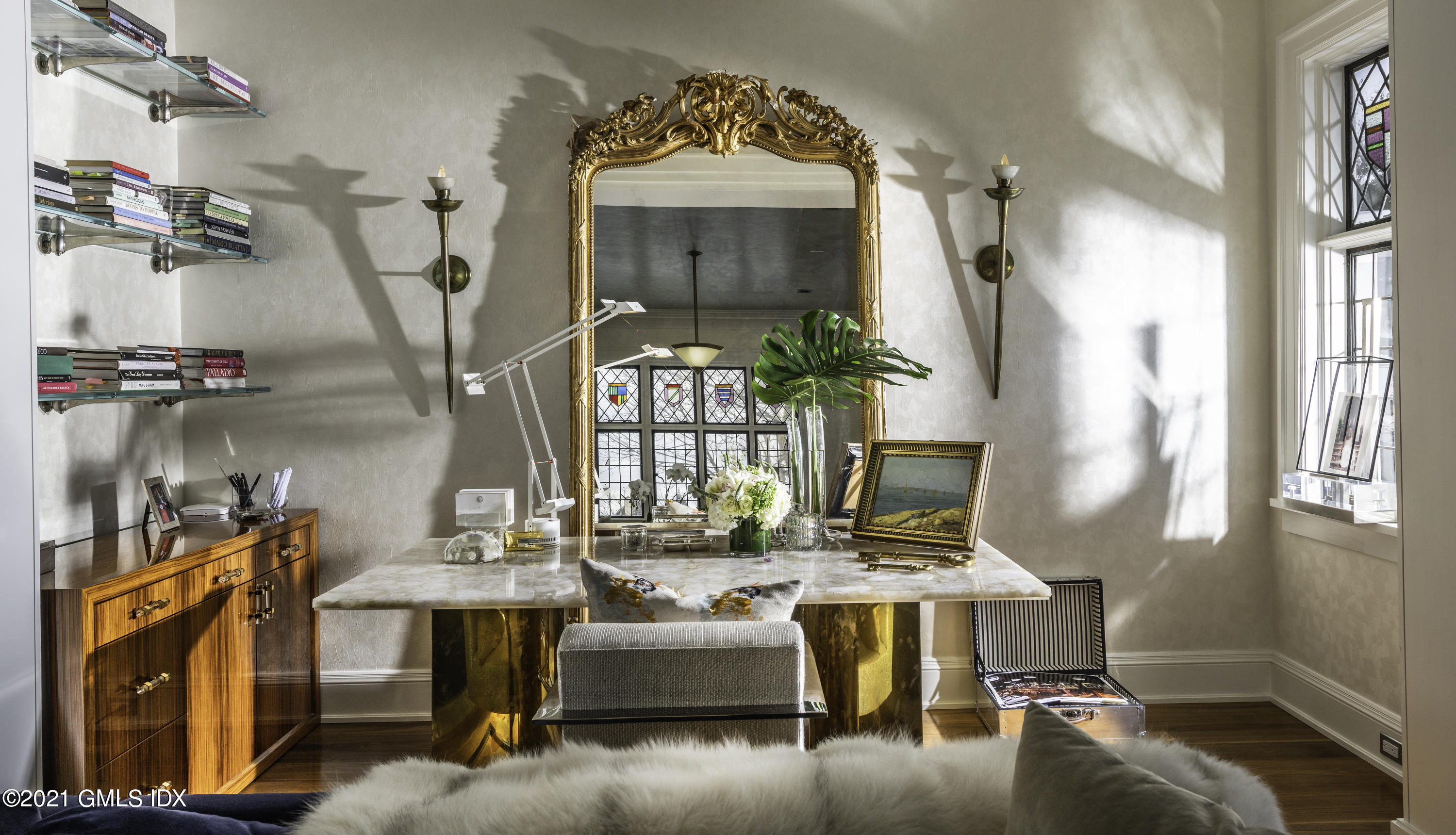 55 Byram Shore Road Greenwich, CT 06830 - Photo 5 of 30 a living room with furniture and a chandelier