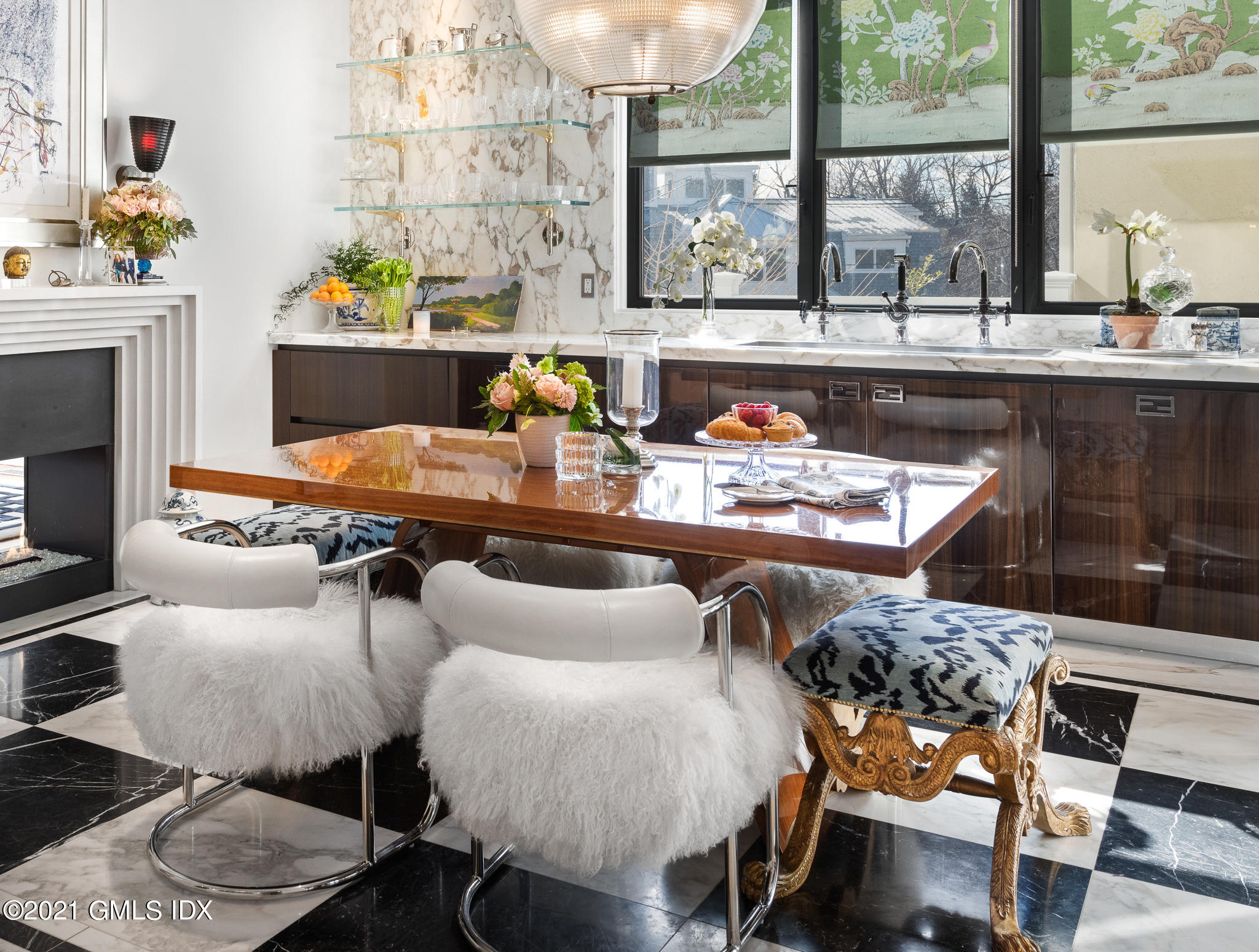 55 Byram Shore Road Greenwich, CT 06830 - Photo 8 of 30 a living room with furniture and a table