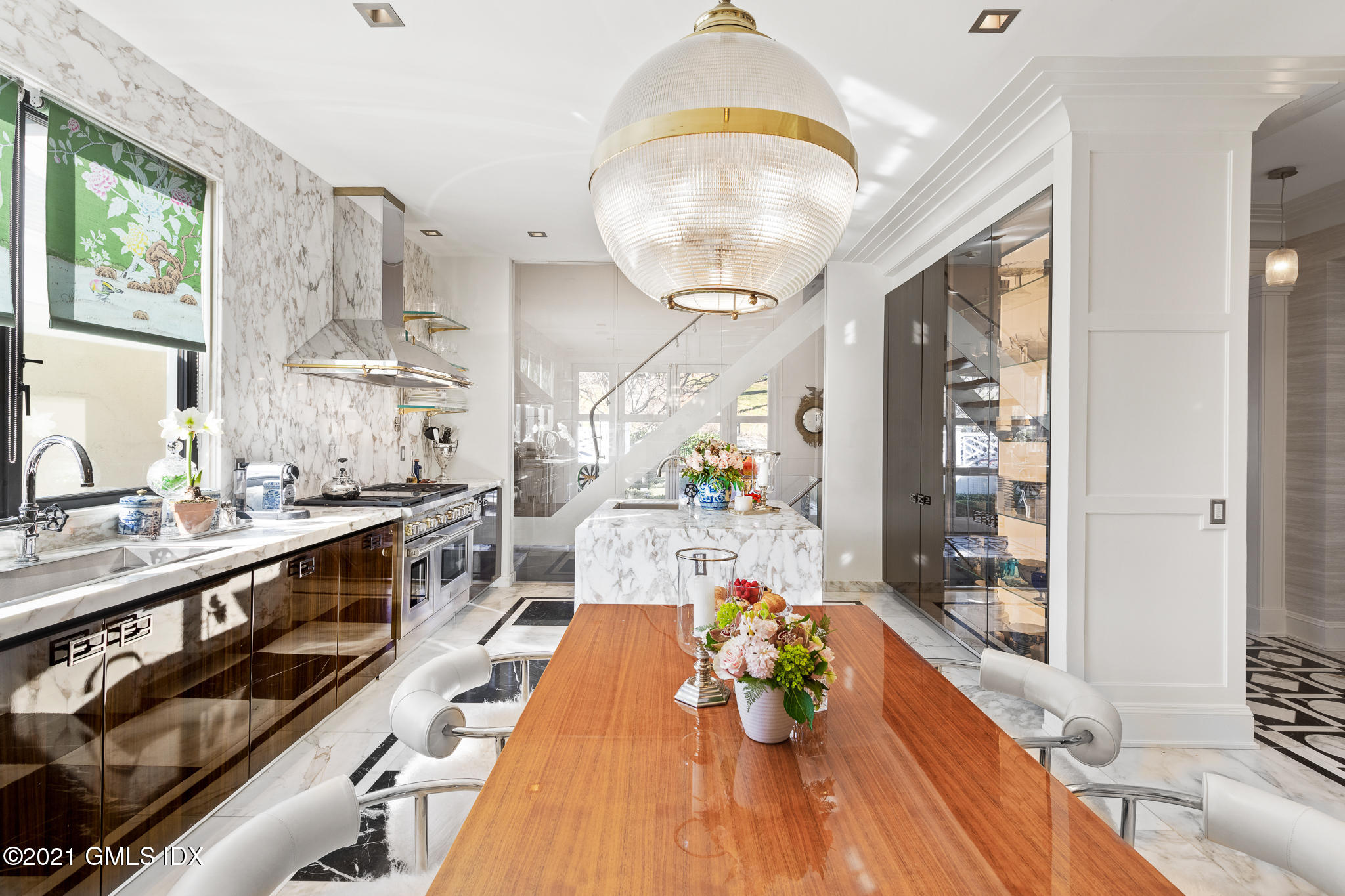 55 Byram Shore Road Greenwich, CT 06830 - Photo 9 of 30 a large white kitchen with a large window