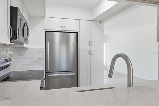 a close view of a refrigerator in kitchen