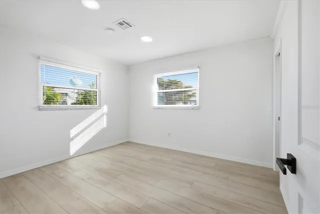 an empty room with a bathroom