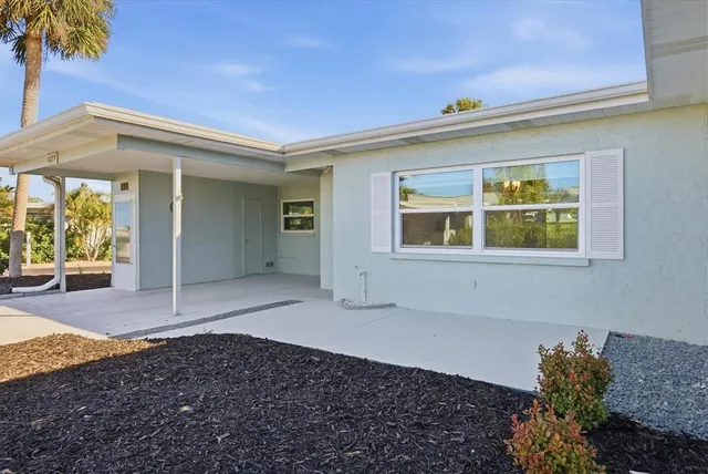 an aerial view of a city with lots of residential buildings