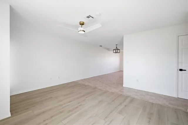 a view of a room with hardwood floor