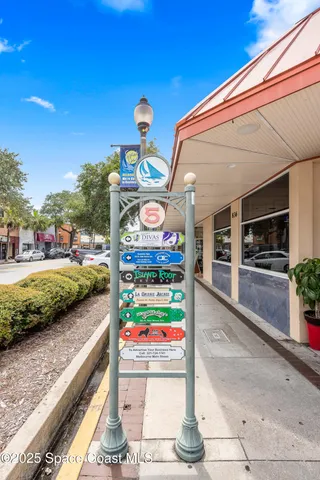 a view of parking space with cars parked