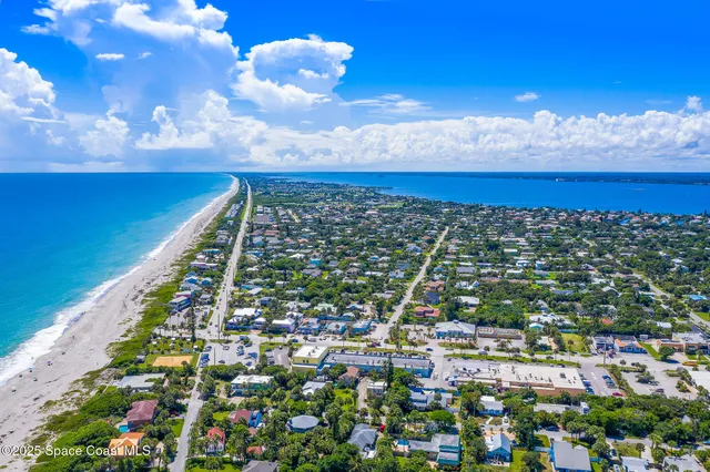 a view of a road with an ocean view
