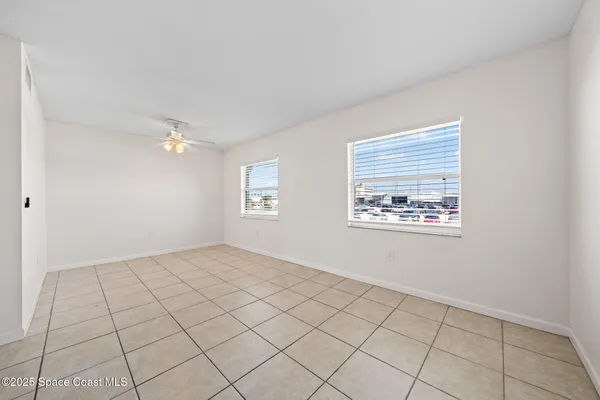 a view of an empty room and window