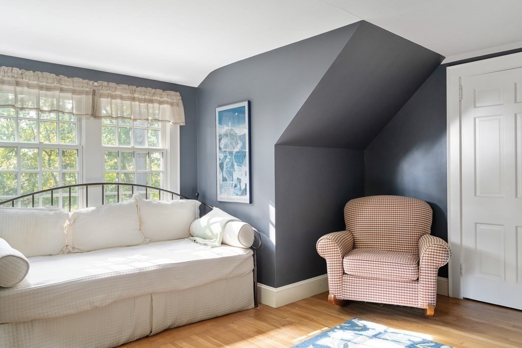 8 Nob Hill Road Wayland, MA 01778 - Photo 20 of 28 a living room with furniture and a large window