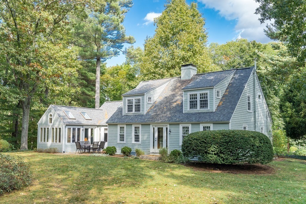 8 Nob Hill Road Wayland, MA 01778 - Photo 4 of 28 a aerial view of a house next to a big yard and large trees