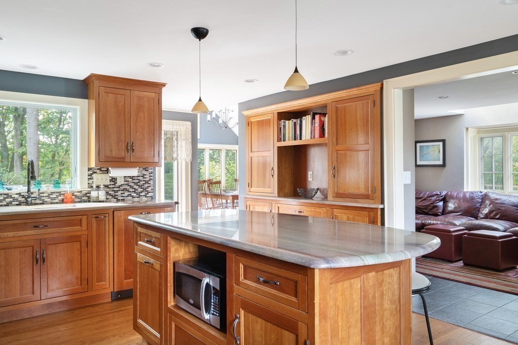 8 Nob Hill Road Wayland, MA 01778 - Photo 8 of 28 a kitchen with stainless steel appliances granite countertop a sink a stove and a wooden floors