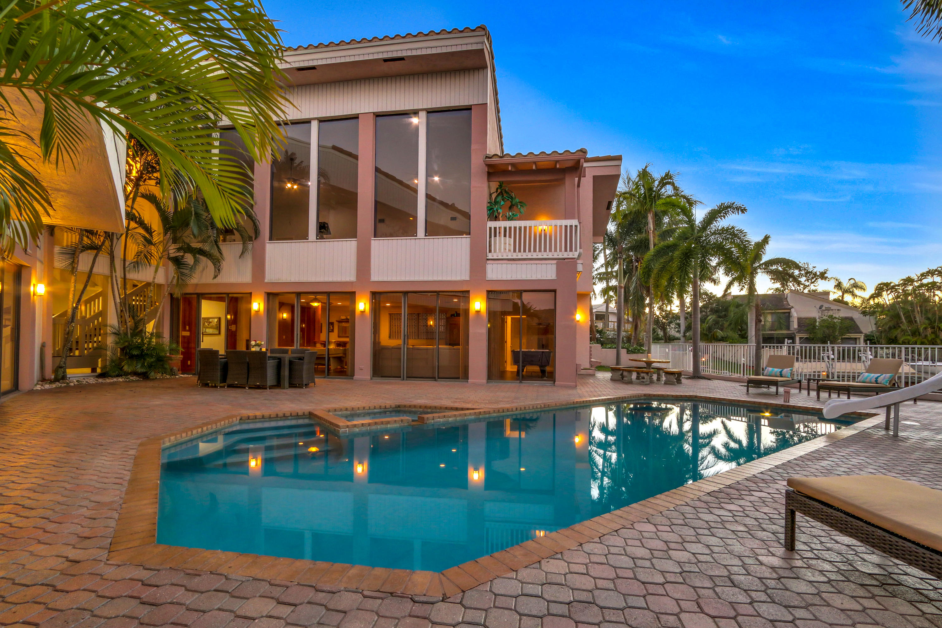 1583 Southwest 6th Terrace Boca Raton, FL 33486 - Photo 4 of 36 a view of a house with a swimming pool