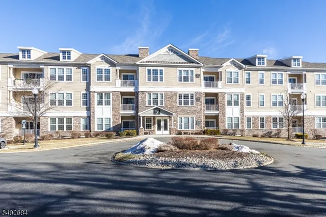 a front view of a building with street view
