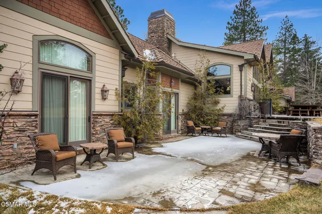 a blue chair sitting in front of a building