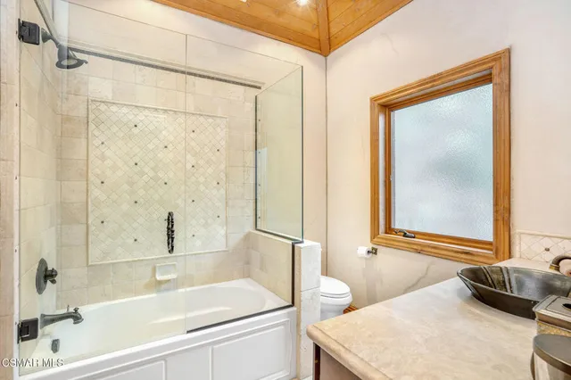 a view of a town with house in the background