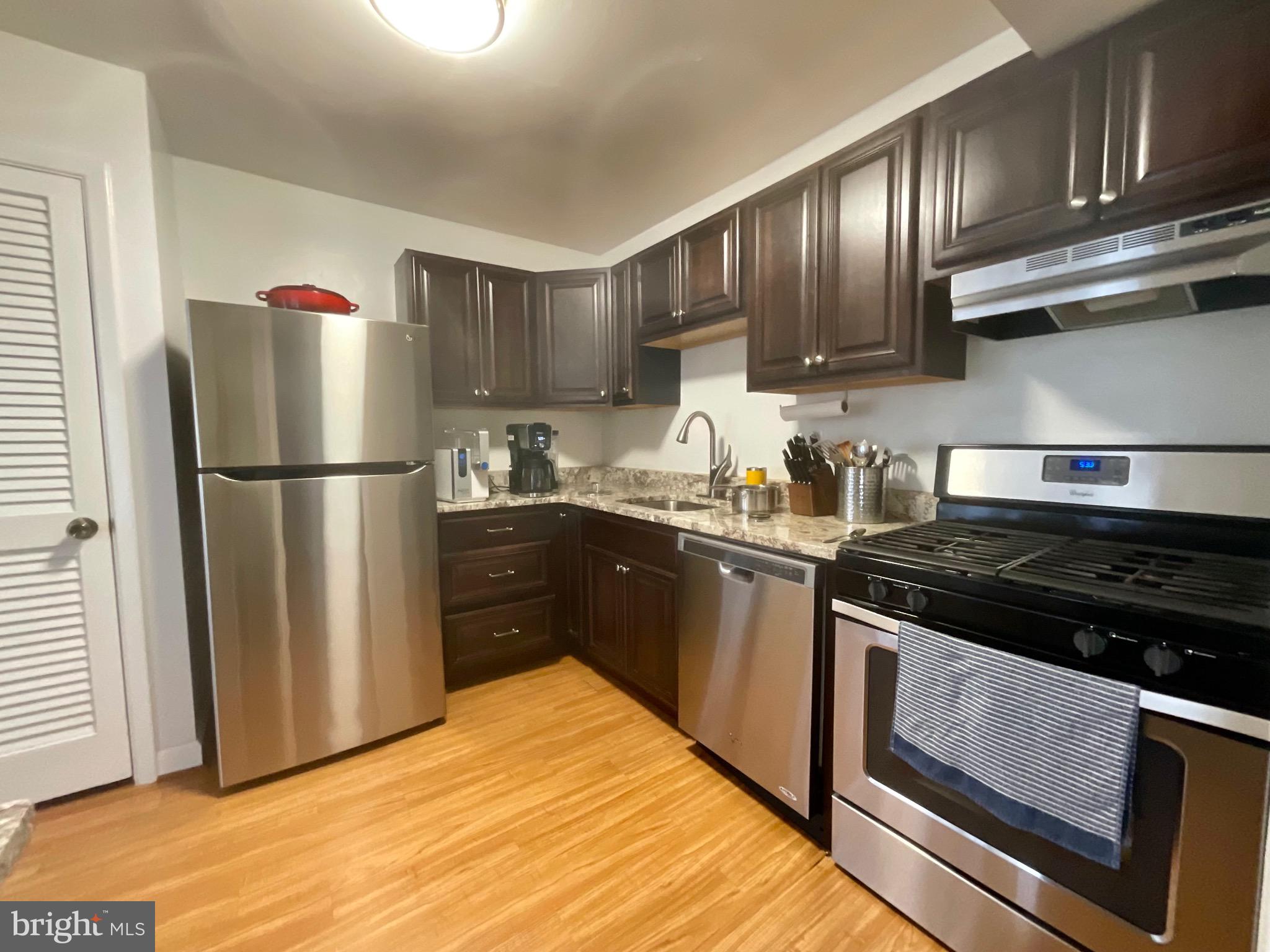14429 Parkvale Road, Unit 3 Rockville, MD 20853 - Photo 12 of 28 Kitchen from hallway has pantry closet