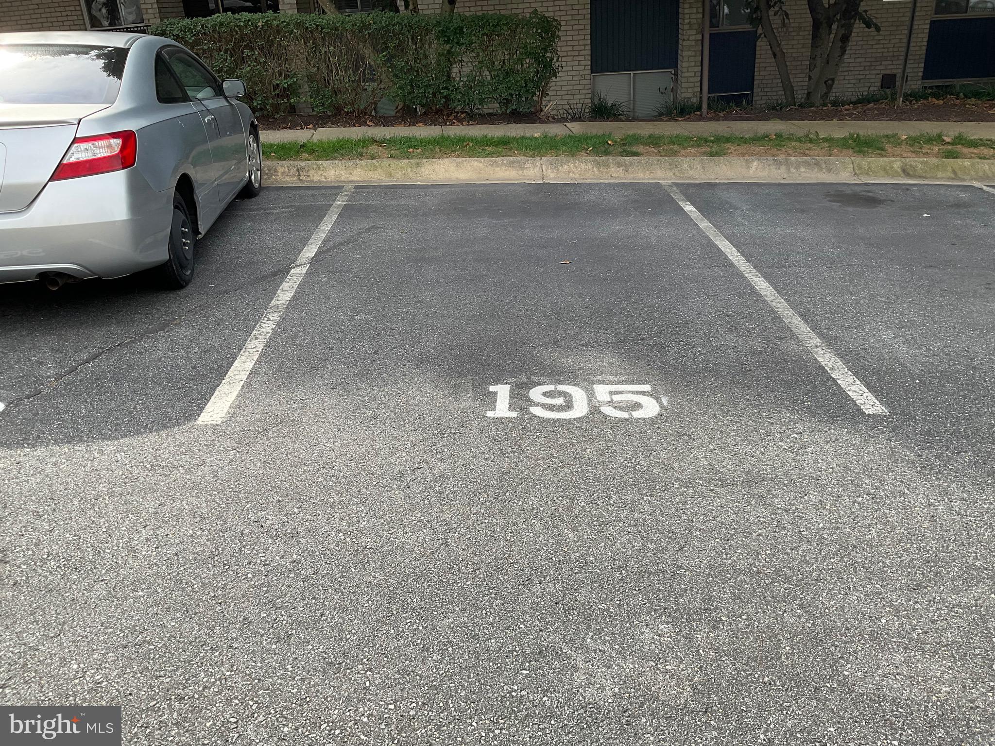 14429 Parkvale Road, Unit 3 Rockville, MD 20853 - Photo 23 of 28 Your assigned parking space in front of your bdg