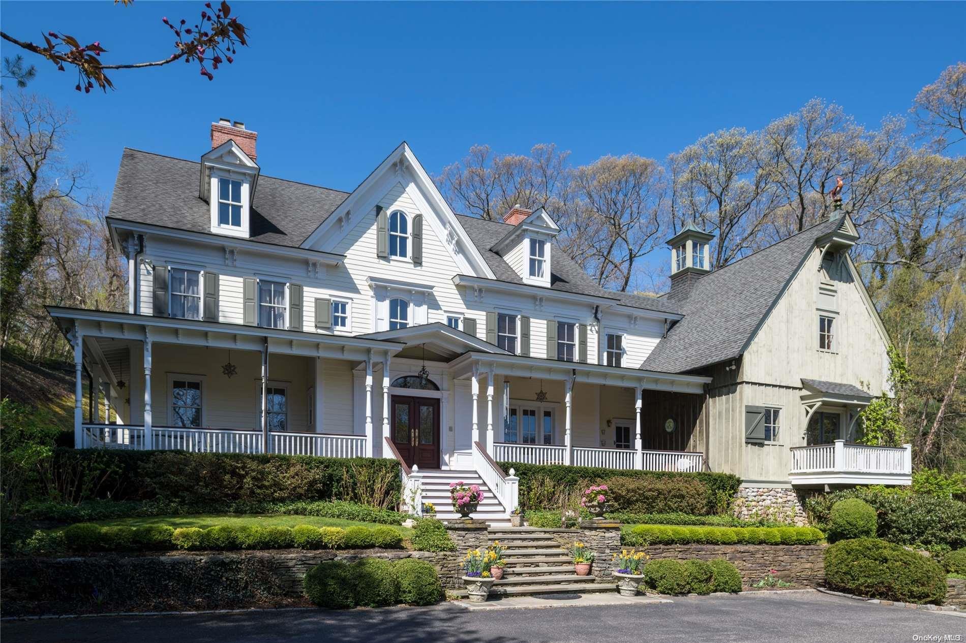 100 Turkey Lane Cold Spring Harbor, NY 11724 - Photo 1 of 1 a front view of a house with a yard