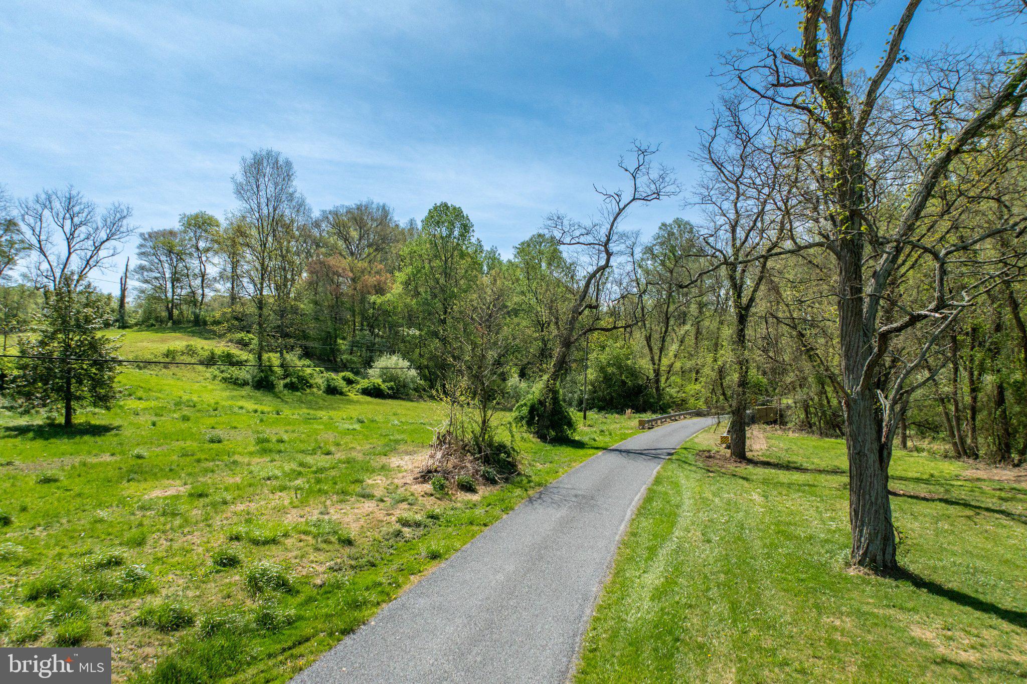 380 Glen Roy Road Nottingham, PA 19362 - Photo 4 of 45 Serene path through lush greenery.