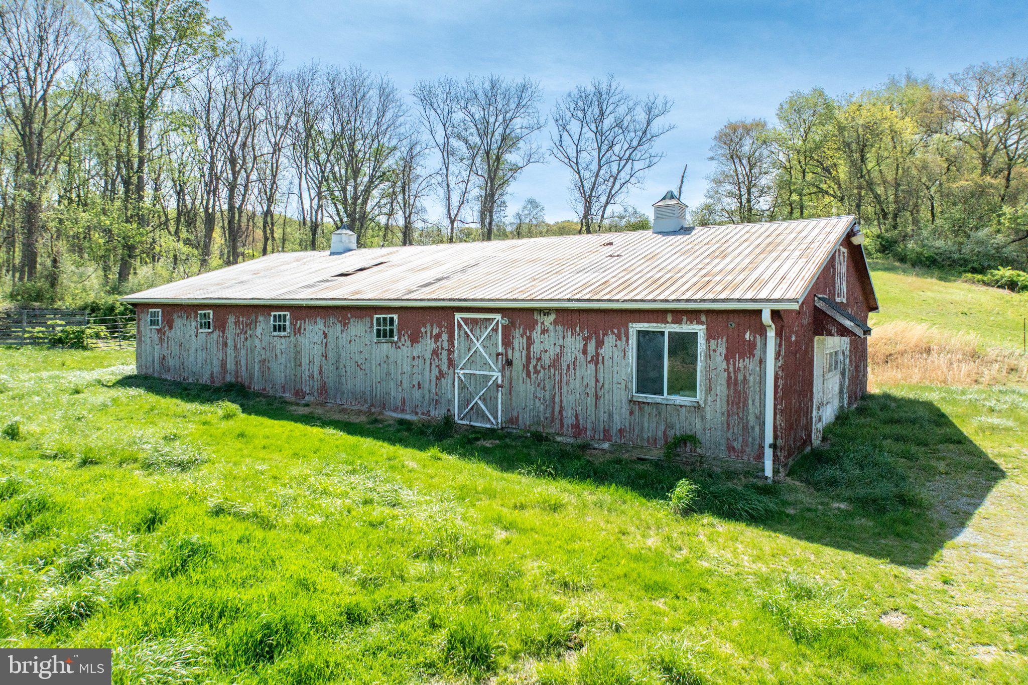 380 Glen Roy Road Nottingham, PA 19362 - Photo 5 of 45 Rustic barn nestled in lush greenery.