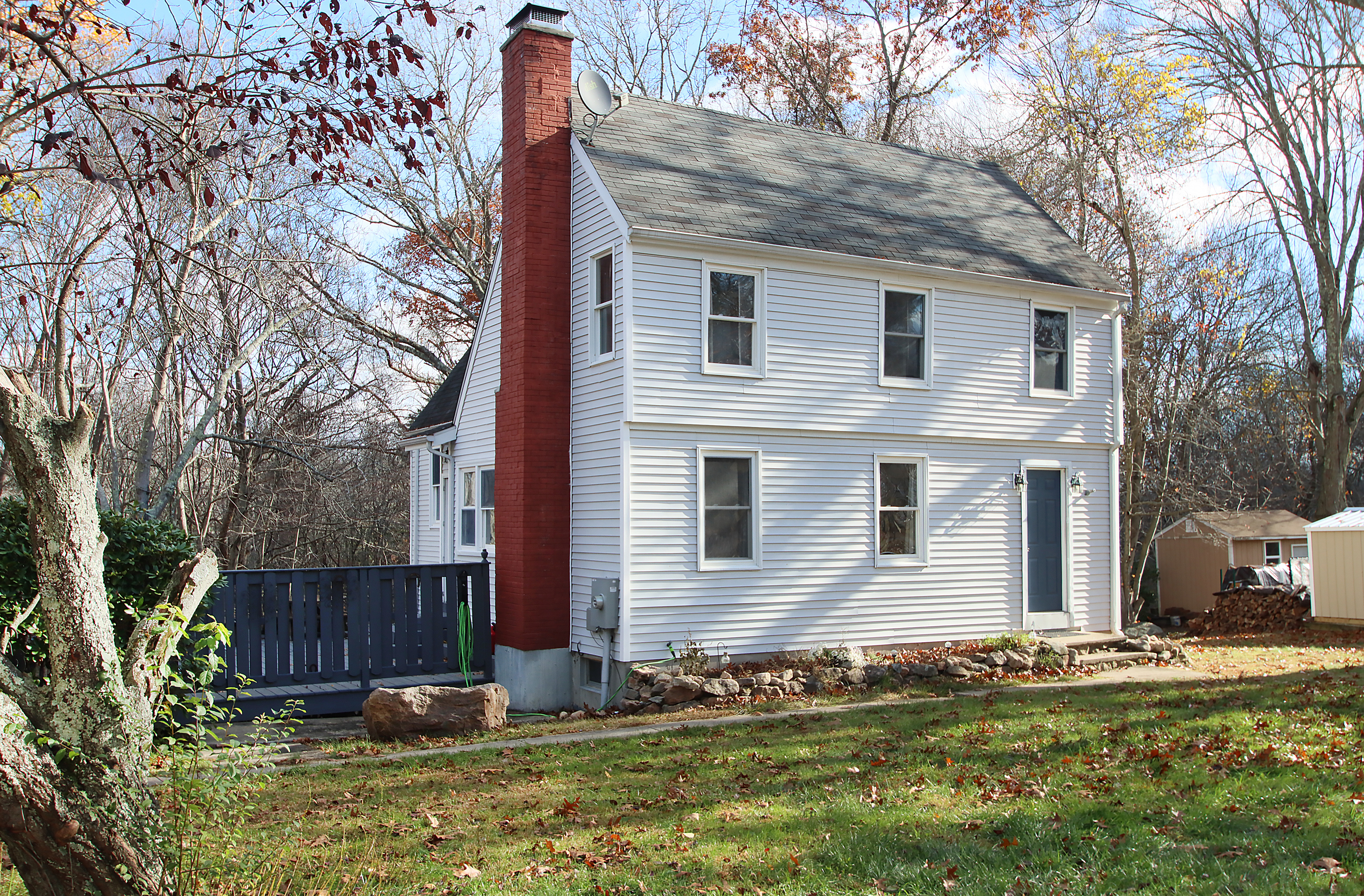 20 Carriage Drive Clinton, CT 06413 - Photo 1 of 31 a view of a house with backyard and trees