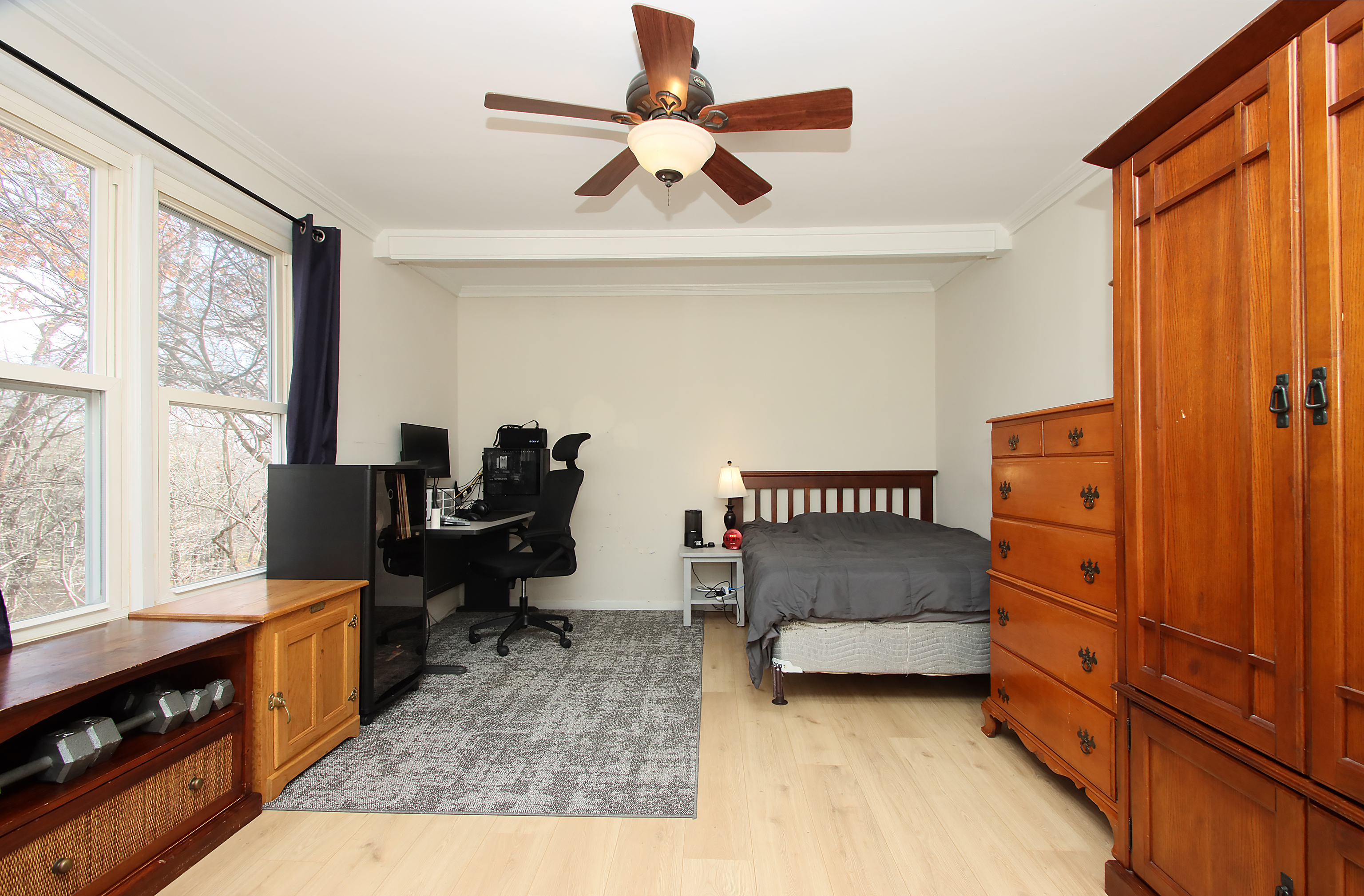 20 Carriage Drive Clinton, CT 06413 - Photo 16 of 31 a bedroom with a dresser and a window