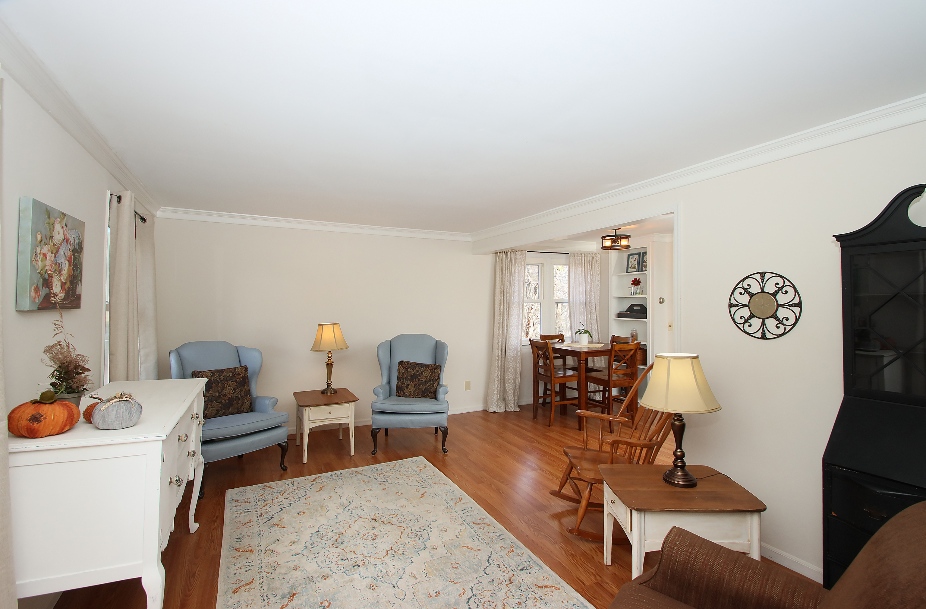 20 Carriage Drive Clinton, CT 06413 - Photo 2 of 31 a living room with furniture and wooden floor