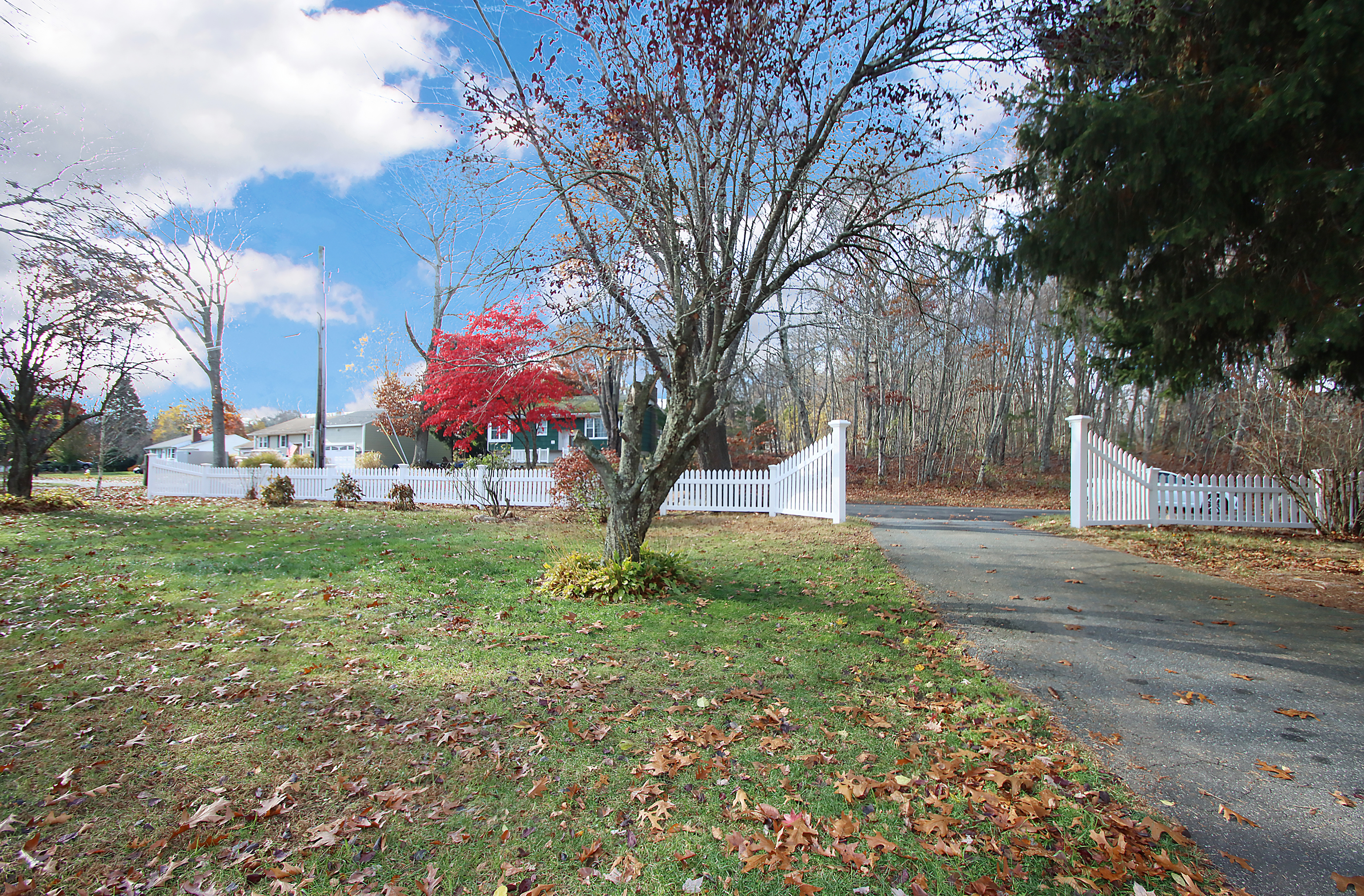 20 Carriage Drive Clinton, CT 06413 - Photo 24 of 31 a backyard of a house with lots of green space