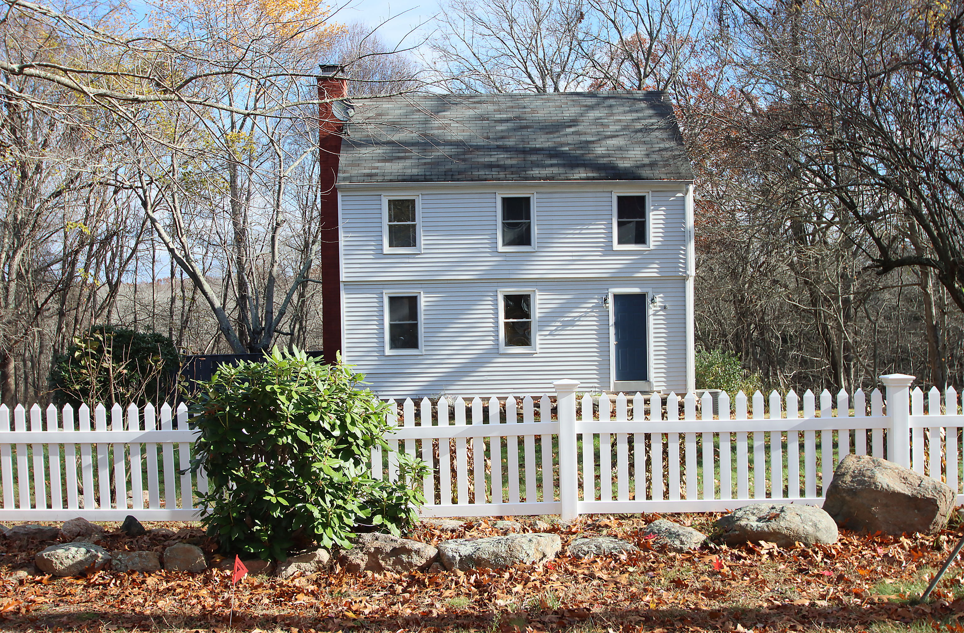 20 Carriage Drive Clinton, CT 06413 - Photo 29 of 31 a front view of a house with a garden